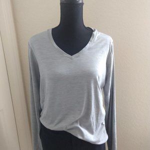 Heather gray, RBX women's long sleeve pullover V-neck shirt with thumb holes